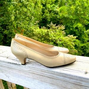 Salvatore Ferragamo Spectator pumps, size 7B, beige/tan.